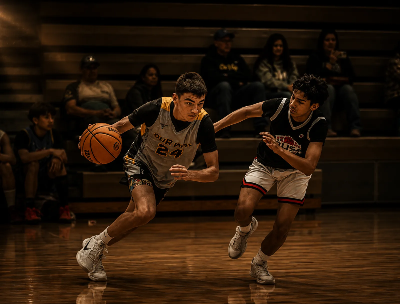 OW player attacking downhill with the ball, defender on his hip, crowd behind