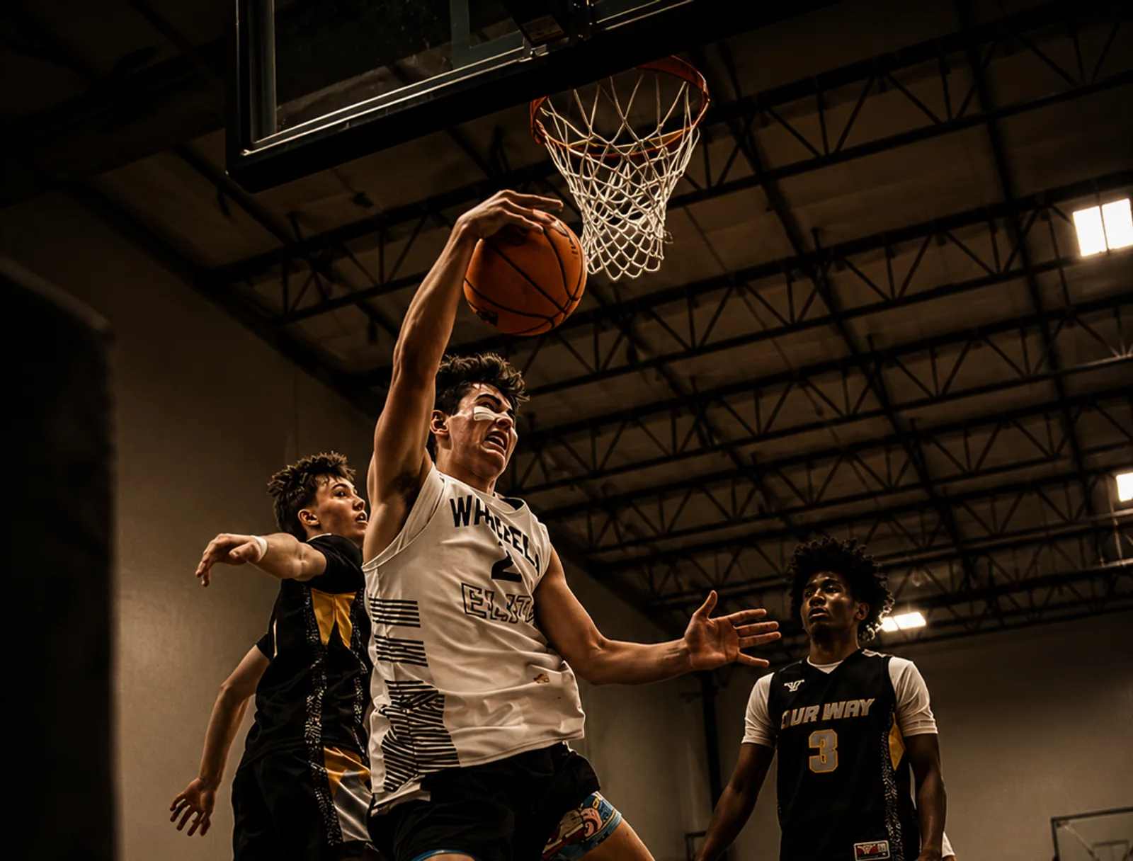 A contested finish at the rim during an OW game against Wheel Elite